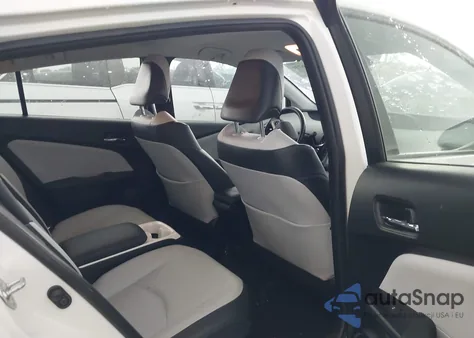 2018 Toyota Prius Prime Premium из США, поврежденный, VIN JTDKARFP0J3084142